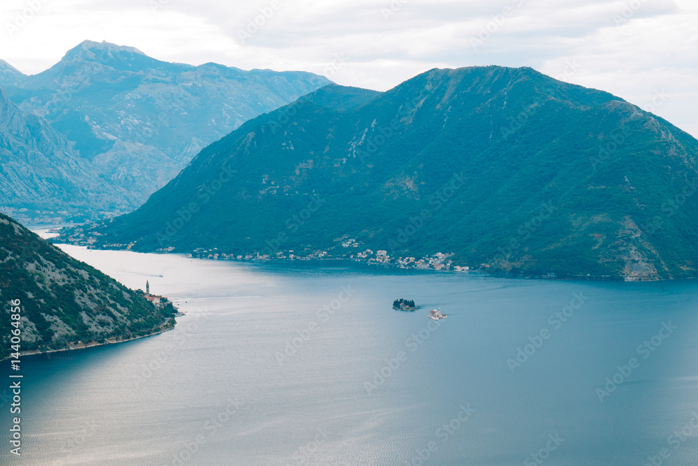 The island of Gospa od Skrpela, Kotor Bay, Montenegro. View from the high mountain above Risan.