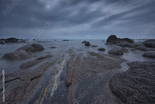 Seascape before sunrise in cloudy morning. Beautiful natural seascape, blue hour. Rocky sunrise. Sea sunrise at the Black Sea coast near Atia, Chernomoretz photo