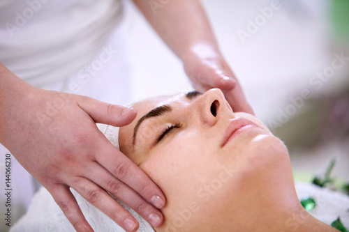 Skin And Body Care. Close-up Of A Young Woman Getting Spa Treatment At Beauty Salon. Spa Face Massage. Facial Beauty Treatment. Spa Salon.