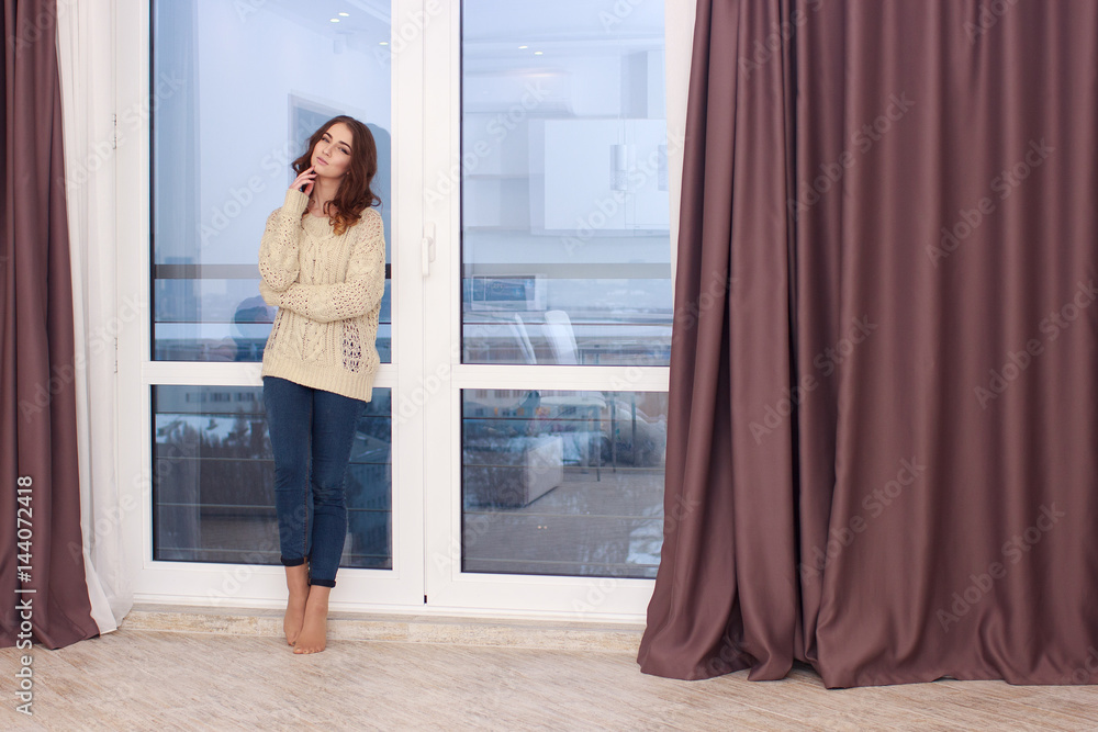 Girl Standing Near Window At Home Girl Standing Near Window At Home