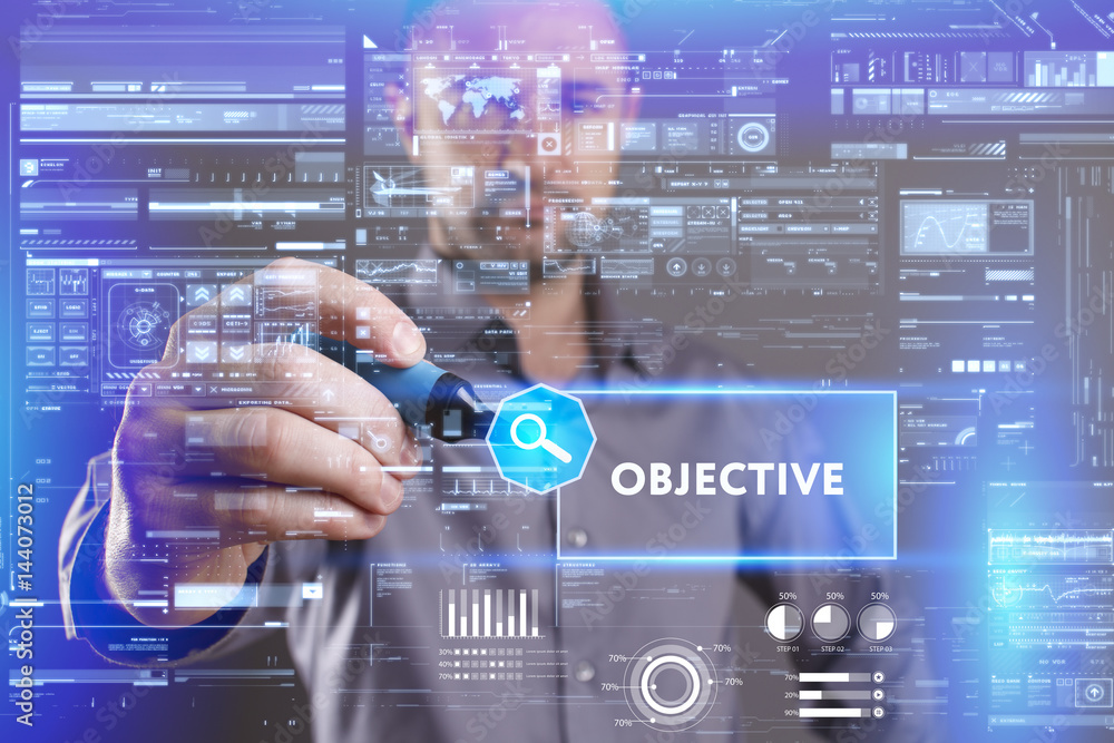 Business, Technology, Internet and network concept. Young businessman working on a virtual screen of the future and sees the inscription: Objective Business, Technology, Internet and network concept. Young businessman working on a virtual screen of the future and sees the inscription: Objective