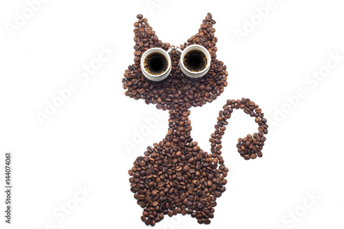 Cat made of coffee beans over white background