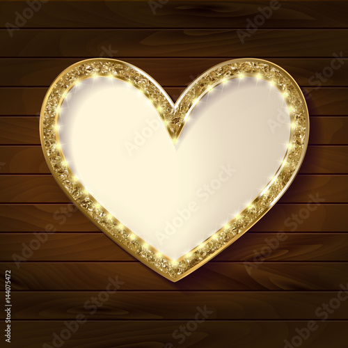 Frame cinema heart on wooden background