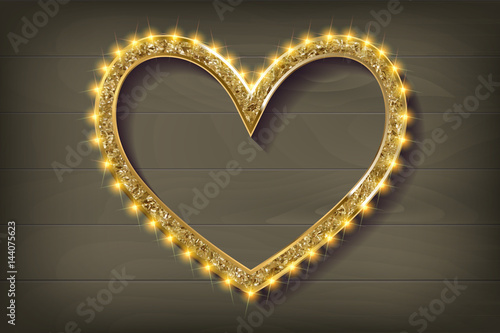 Frame cinema heart on wooden background