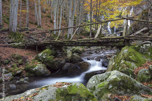 Wooden bridge at the Dardagna waterfalls, Corno Alle Scale Regional Park, Lizzano in Belvedere, Emilia Romagna, Italy. photo