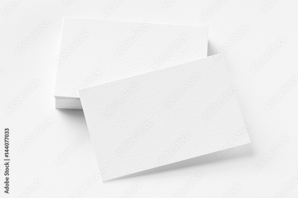 Photo of business cards. Template for branding identity. Isolated with clipping path. Photo of business cards. Template for branding identity. Isolated with clipping path.