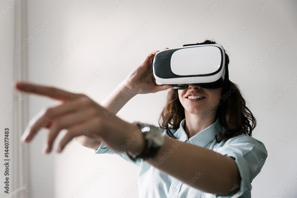 A Young Girl Using VR In The Office A Young Girl Using VR In The Office