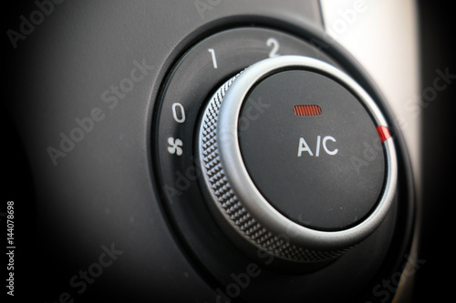 button to turn on the air conditioner