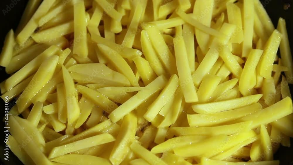 Home Made French Fries. Frying French Fries In Boiling Oil Home Made French Fries. Frying French Fries In Boiling Oil