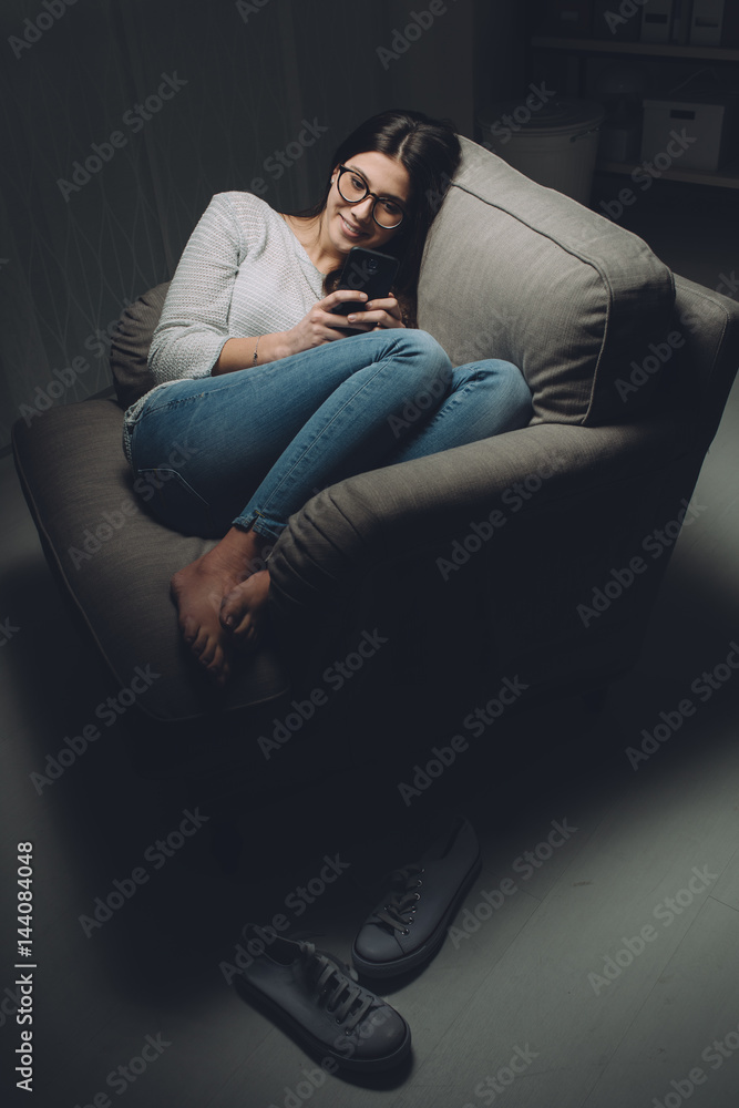 Woman texting late at night Woman texting late at night