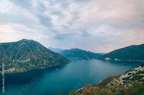 Fototapeta Naklejka Na Ścianę i Meble -  The island of Gospa od Skrpela, Kotor Bay, Montenegro. View from the high mountain above Risan.