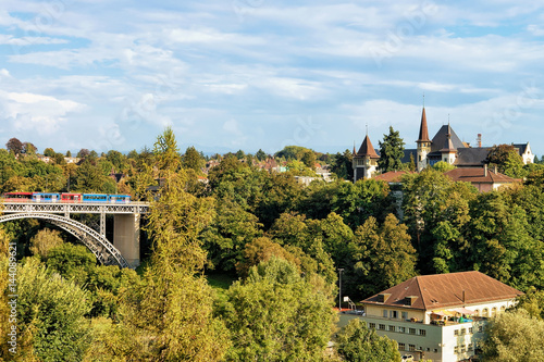 Fototapeta Naklejka Na Ścianę i Meble -  Panorama with Kirchenfeld bridge with tram and Historical Museum Bern