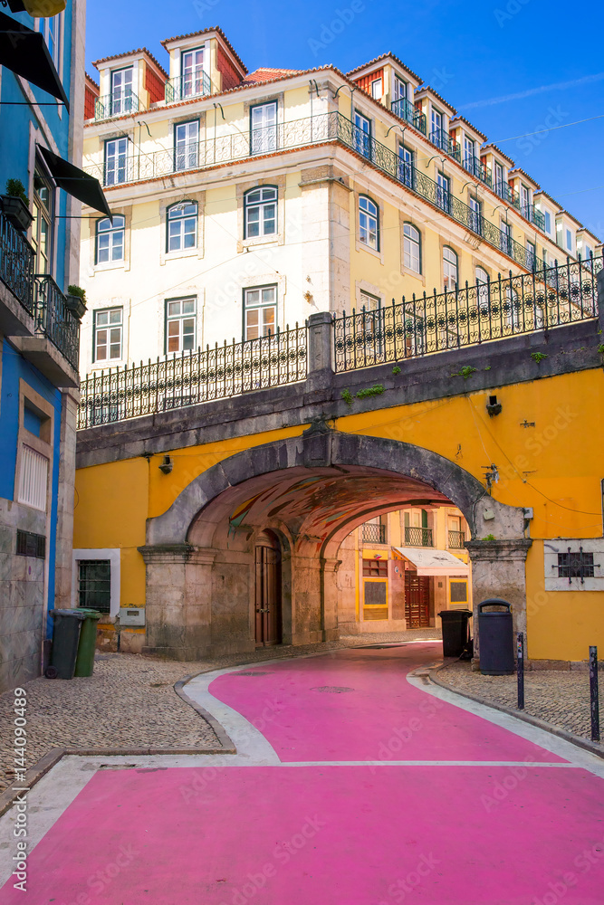 The famous pedestrian Pink street of Rua Nova do Carvalho in the Cais do Sodre area of Lisbon, Portugal