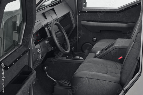 Car interior with control panel black leather. 3D rendering © ARTYuSTUDIO