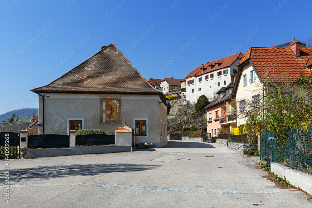 View of a residential street in the market town of Weissenkirchen in der Wachau. The district of Krems-Land, Lower Austria. View of a residential street in the market town of Weissenkirchen in der Wachau. The district of Krems-Land, Lower Austria.