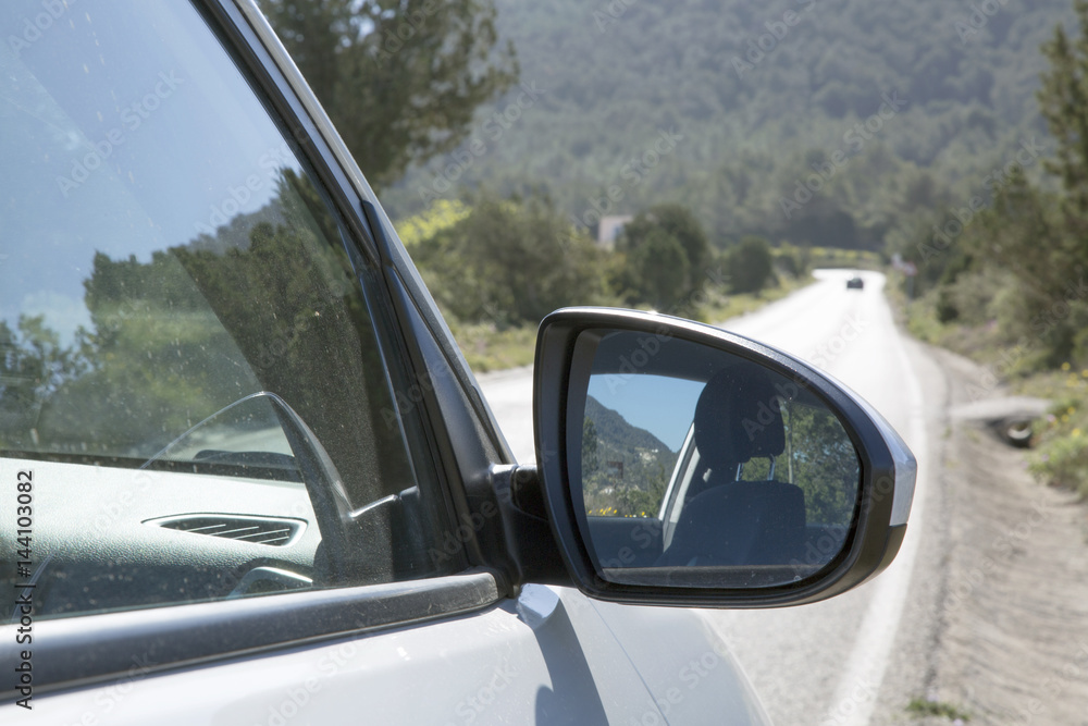 Naklejka premium Wing Mirror on Open Road; Ibiza