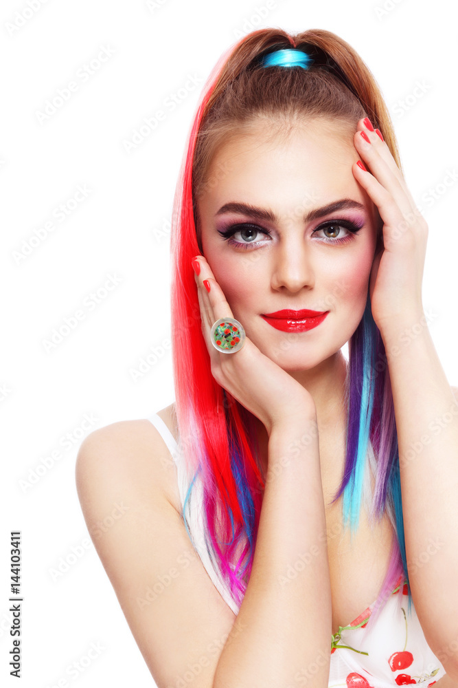 Young beautiful sexy smiling girl with colorful ponytail over white background, copy space Young beautiful sexy smiling girl with colorful ponytail over white background, copy space