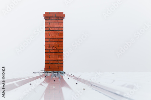 Carta da parati Chimney made of red bricks over white sky