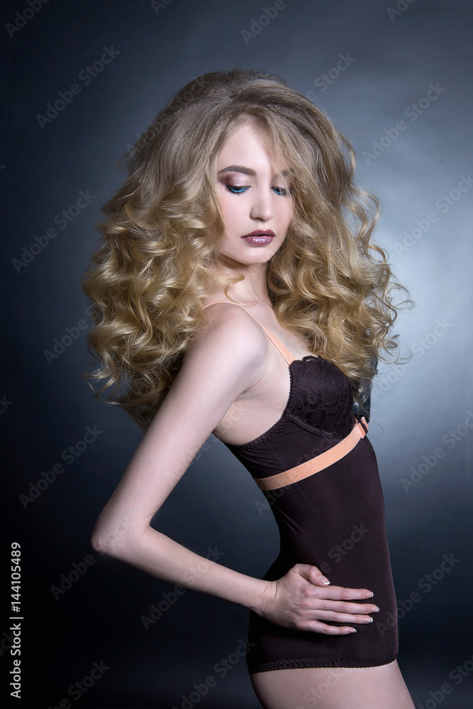 sexy blond woman with curly hair