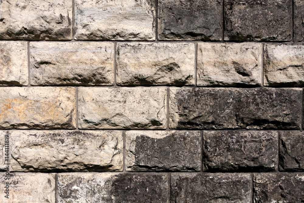 Fototapeta premium Background of black and white bricks.