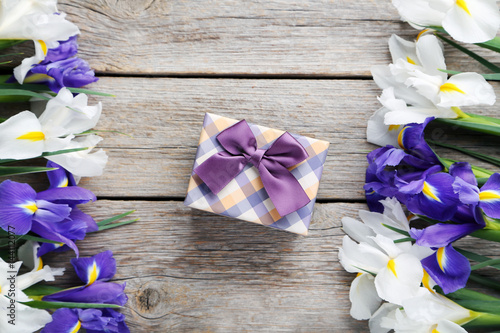 Fototapeta Naklejka Na Ścianę i Meble -  Bouquet of iris flowers on grey wooden table