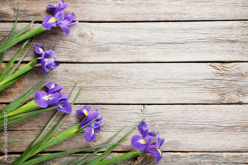 Fototapeta Naklejka Na Ścianę i Meble -  Bouquet of iris flowers on grey wooden table