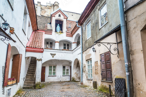 Small courtyard with a sculpture of Maria old town Vilnius Lithuania