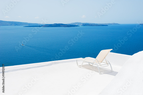 Chaise lounge on the terrace with sea view.