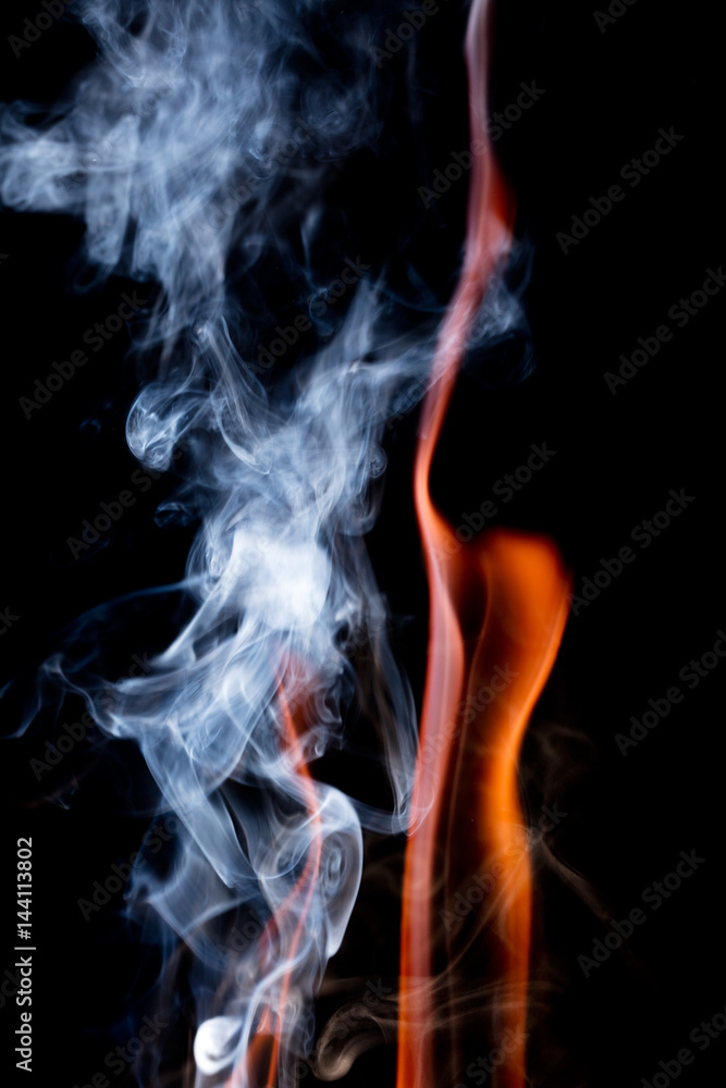 Close up view of natural flame with smoke