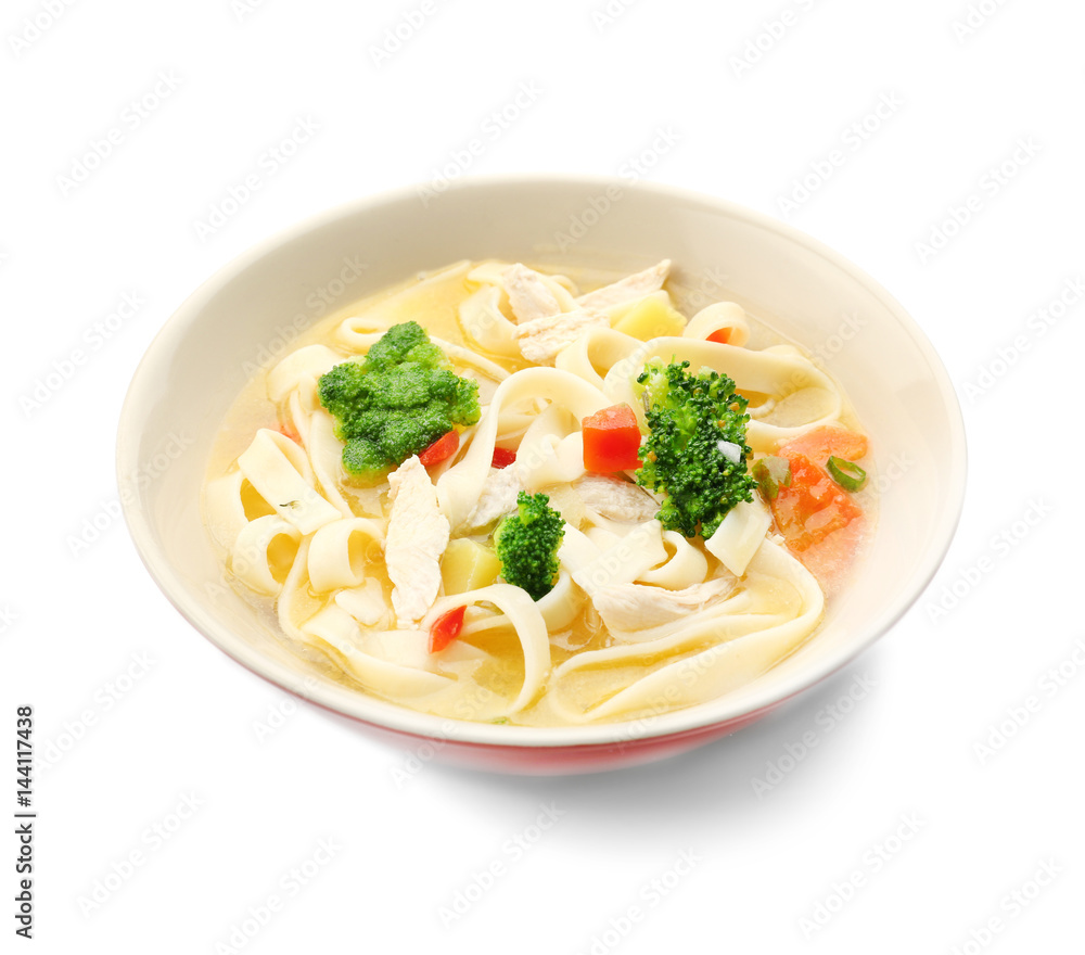Chicken noodle soup in bowl on white background Chicken noodle soup in bowl on white background