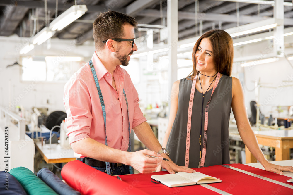 Obraz premium Fashion designers enjoying their work