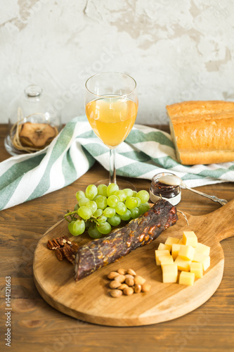 Snacks for wine: grapes, cheese, nuts