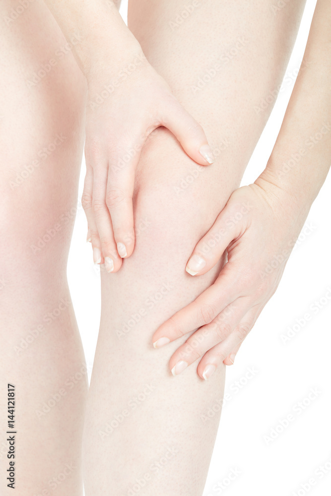 Woman fatigued leg with knee pain isolated on white, clipping path