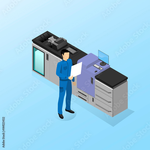 The worker is standing near the machine for digital printing