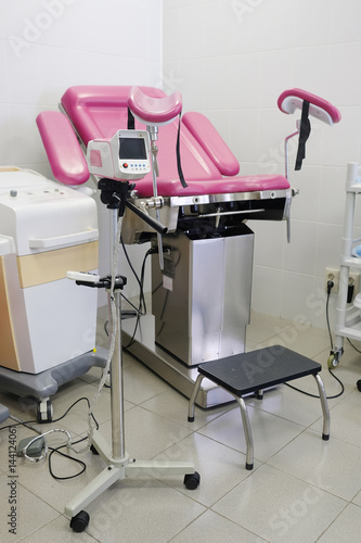 gynecological chair and other medical equipment in a gynecological office