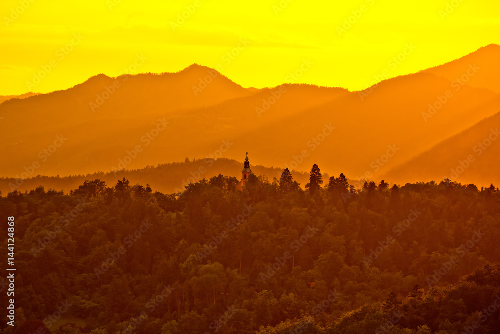 Hills above Ljubljana at yellow sunset view