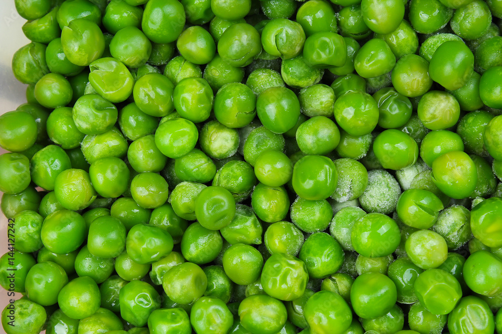 Green peas as background texture. Pea pattern. Green peas as background texture. Pea pattern.