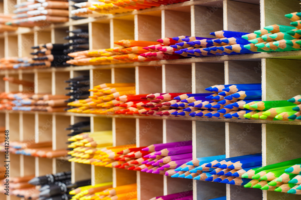 Multicolored pencils in art store closeup