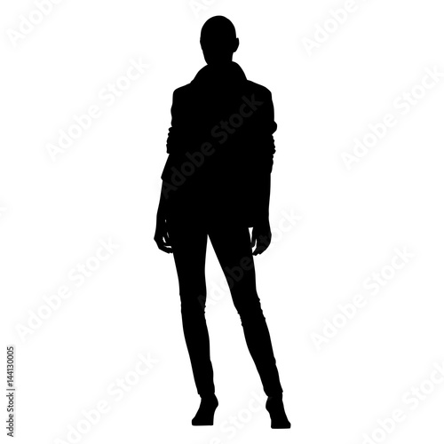 Young slim girl standing, vector silhouette