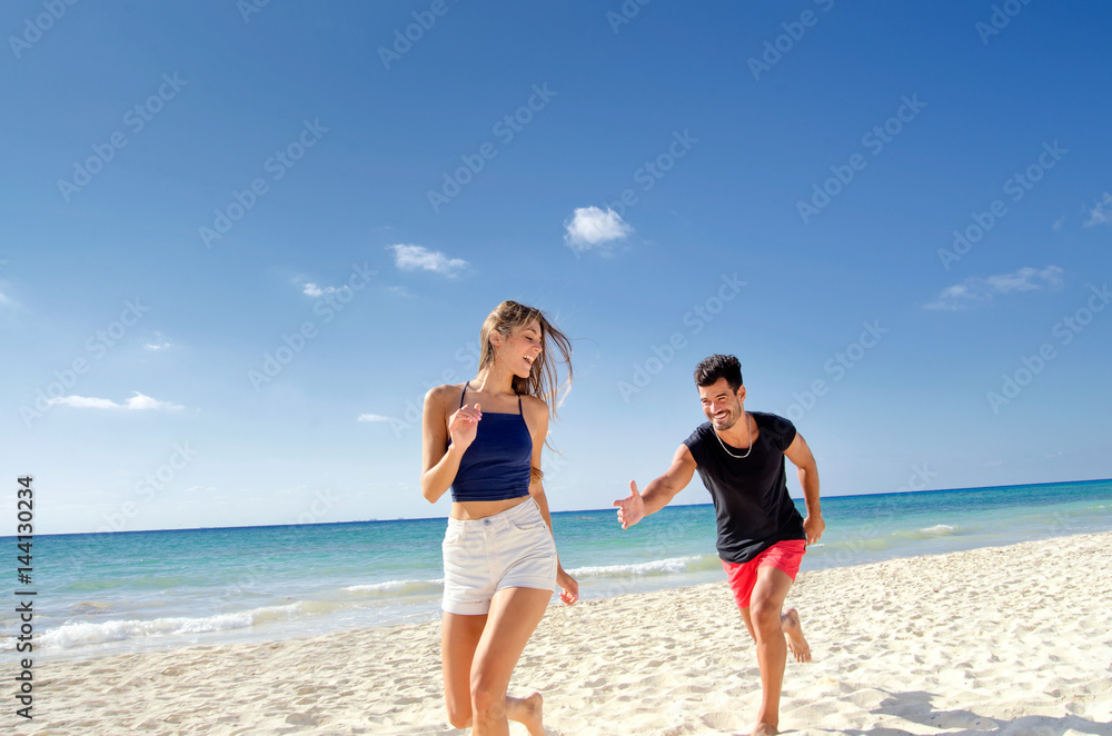 Couple playing on the beach Couple playing on the beach