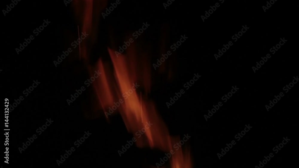 The sparks fly out of fire. Isolated on black background. The sparks fly out of fire. Isolated on black background.