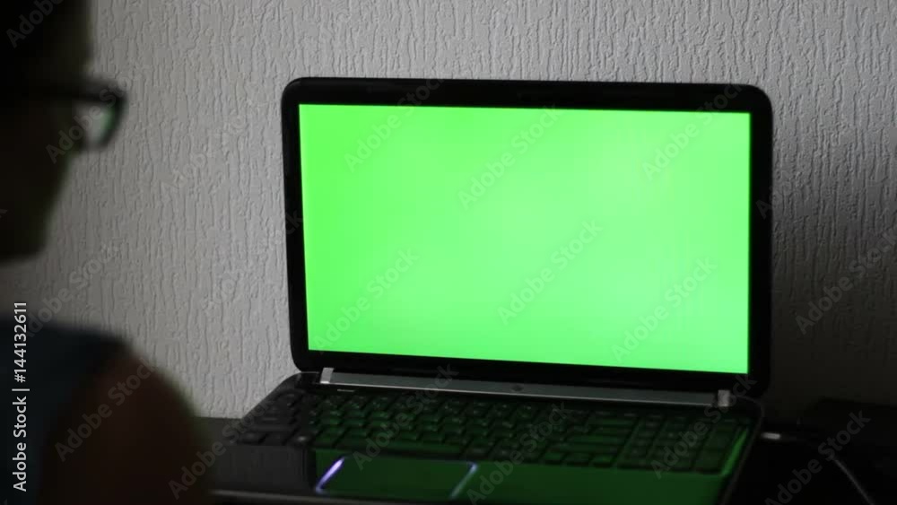 Laptop with a green screen Laptop with a green screen