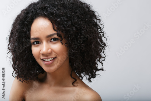 Head and shoulder portrait of beautiful young woman