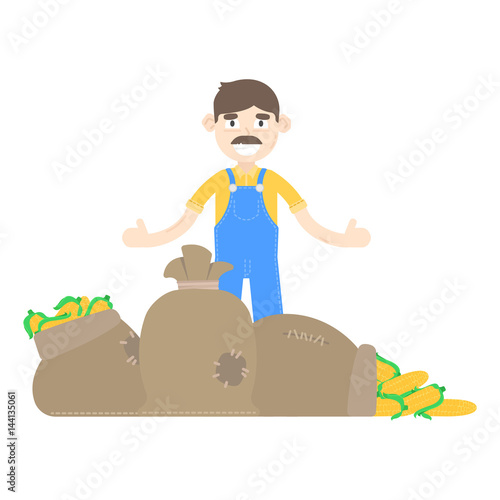 Farmer with mustache dressed in a blue jumpsuit, stand about sacks of corn