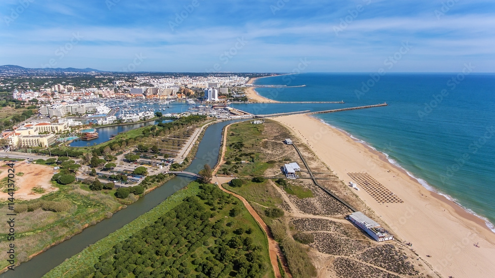 Aerial view of Vilamoura with coastline and docks, Algarve,