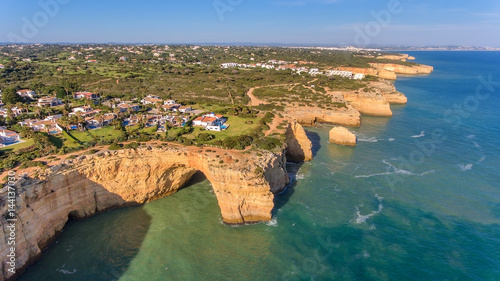 Beach of Benagil is taken from the sky.