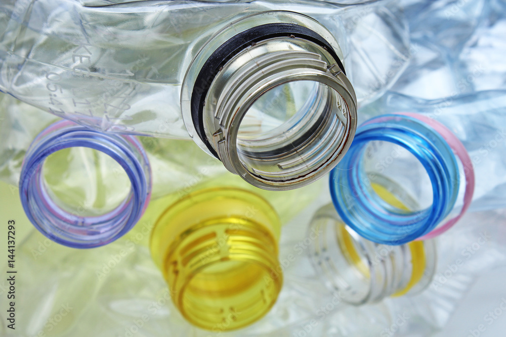 PET bottle pollution closeup texture studio photo. PET bottle pollution closeup texture studio photo.