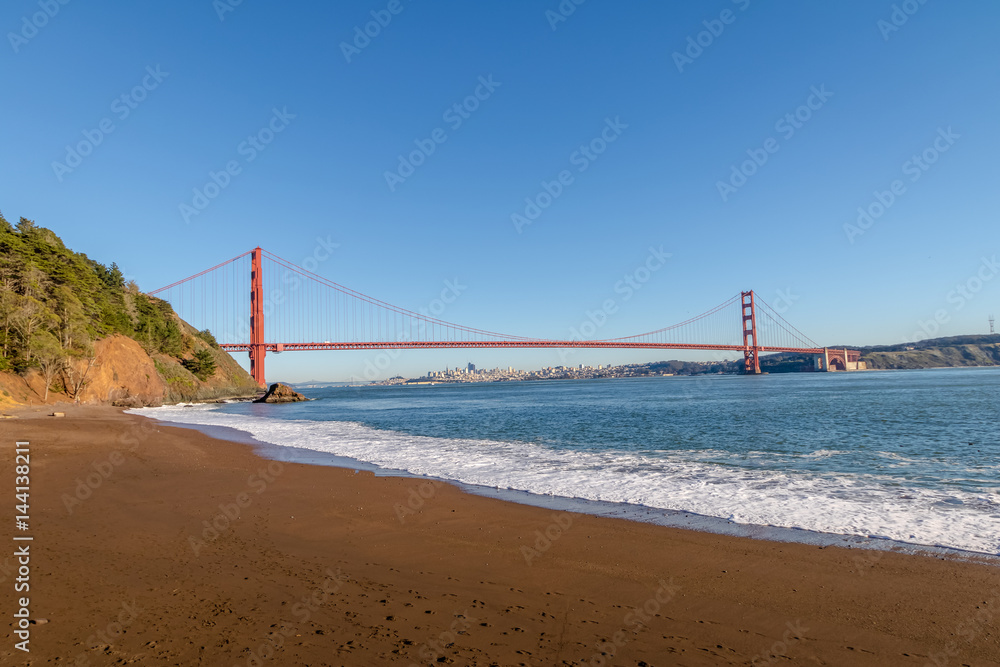 Beach view of Golden Gate Bridge and city Skyline - San Francisco, California, USA Beach view of Golden Gate Bridge and city Skyline - San Francisco, California, USA