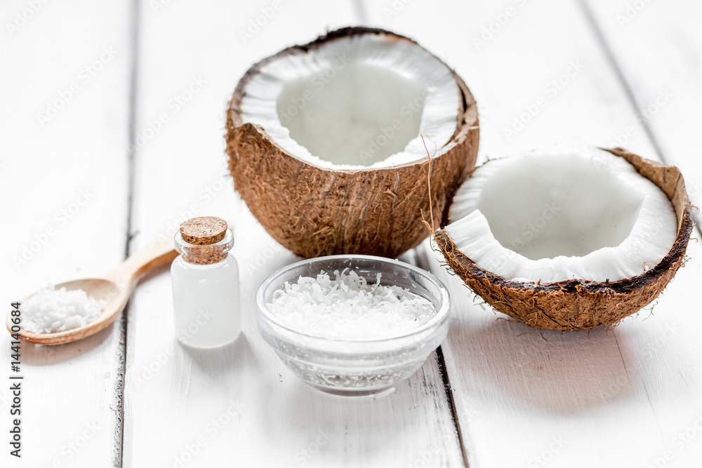 coconut oil for body care in cosmetic concept on white desk coconut oil for body care in cosmetic concept on white desk