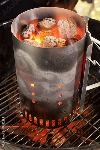 Empty Hot Charcoal Barbecue Grill With Flame. photo